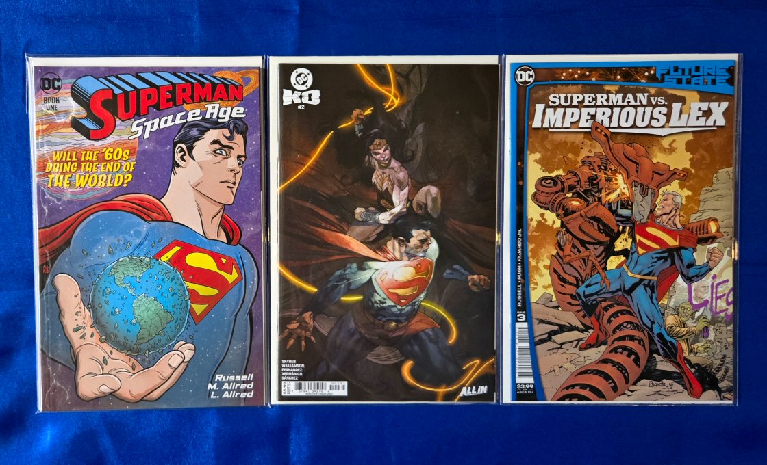 Covers of Superman: Space Age (2022) by Mark Russell and Michael Allred, cover by Michael Allred and Laura Allred; DC K.O. #2 (2025) by Scott Snyder and Javi Fernandez, variant cover E by Simone Bianchi; Future State: Superman vs. Imperious Lex by Mark Russell and Steve Pugh, cover by Yanick Paquette and Nathan Fairbairn