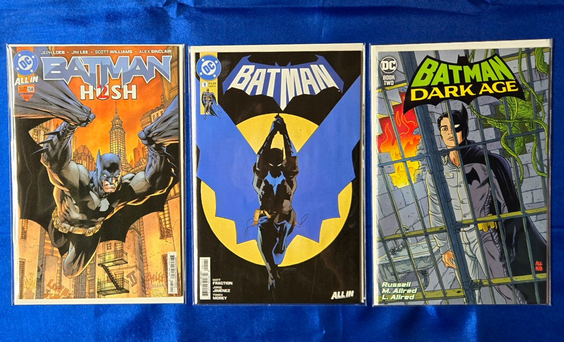 Covers of Batman Vol 3, issue #158, by Jeph Loeb and Jim Lee; Batman Vol 4, issue #1, by Matt Fraction and Jorge Jimenez; and Batman Dark Age Vol 1, issue #2, by Mark Russell and Mike Allred.